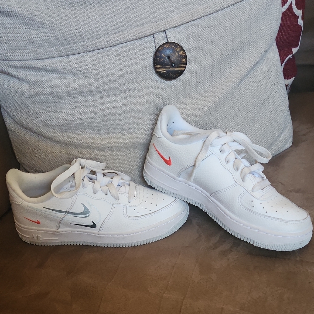 Nike Kids White Sneakers with Red and Blue Accents